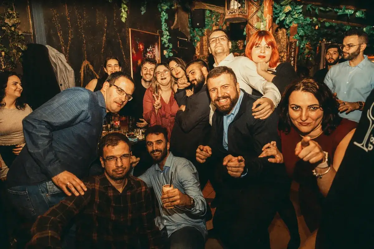 Coinis team celebrating at a company party