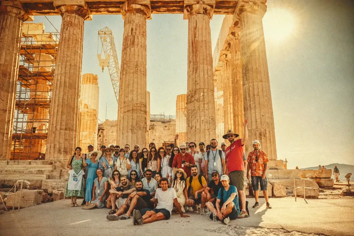 Coinis team at the Acropolis on a sunny day
