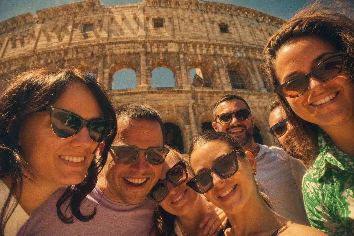 Coinis team selfie at the Colosseum