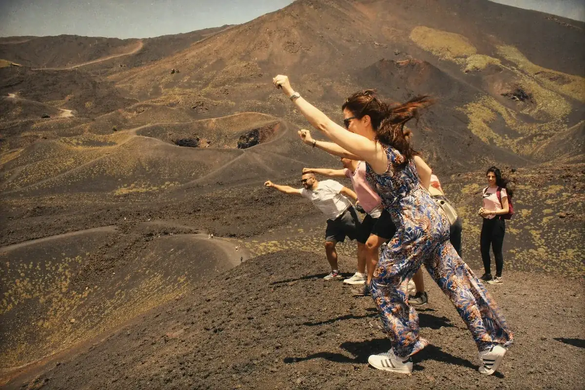 Coinis team hiking on a volcano