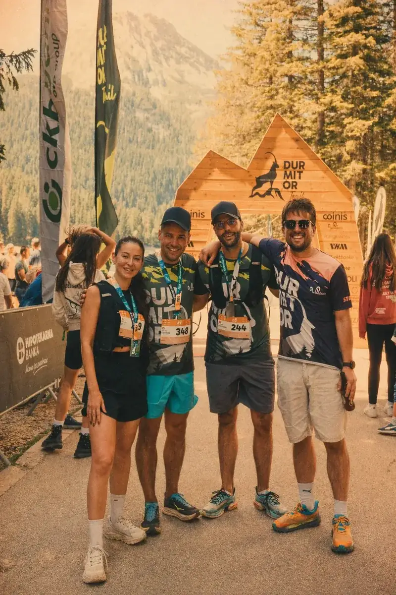 Coinis team runners at a race finish line