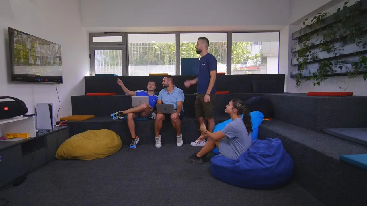 Coinis team working together in the lounge