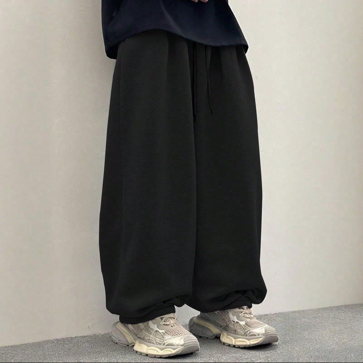 Ecommerce Facebook ad example 46: Men's Extra Loose Casual Sports Pants, Light Gray