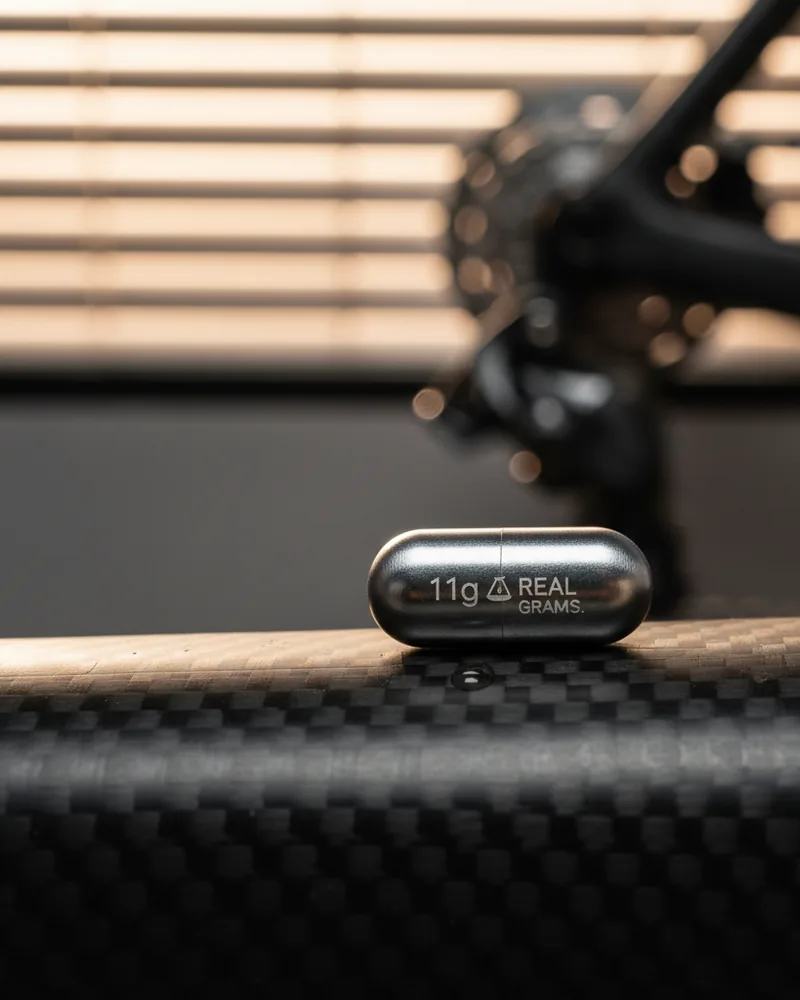 Cycling ad creative example 3: 11 grams lighter. Real grams.