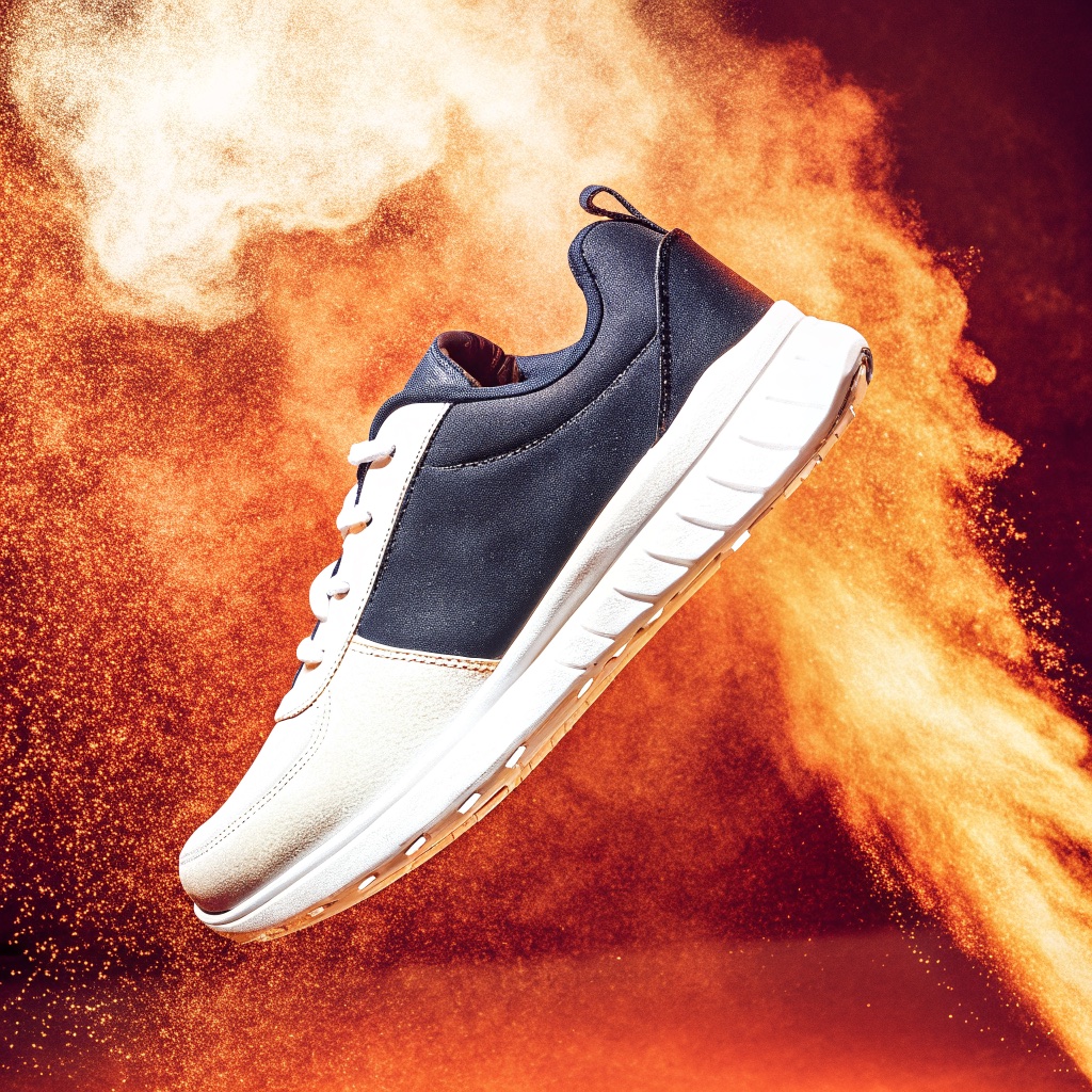 Sneaker. Orange powder burst. Made with Recraft V3.